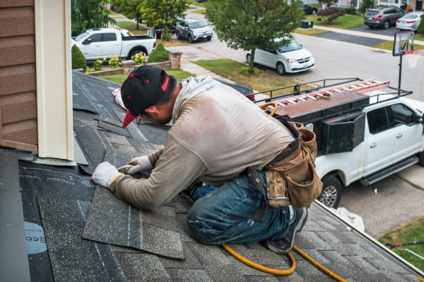 Professional Roofing technician working in Redlands, CA